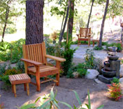 a chair and fountain within our Contemplative Garden